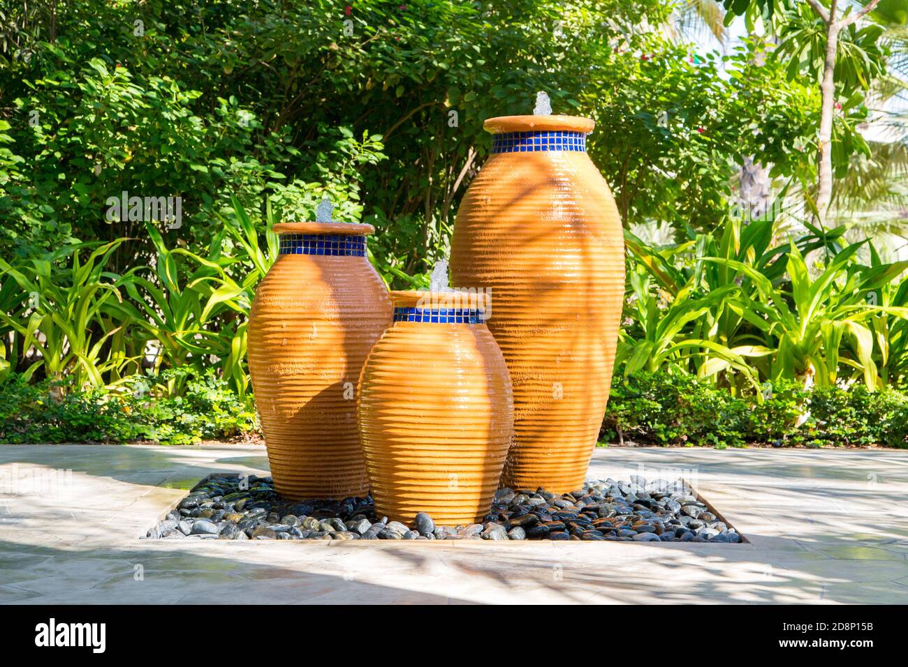 Huge earthen jars designed as fresh fountains in Dubai Stock Photo