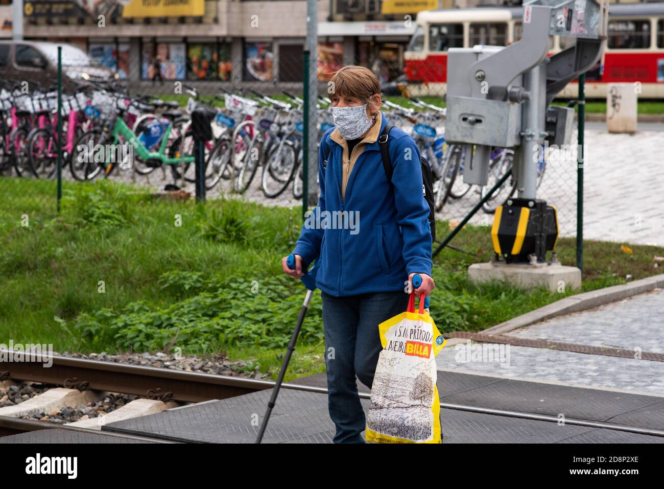 Old woman walking stick hi-res stock photography and images - Alamy