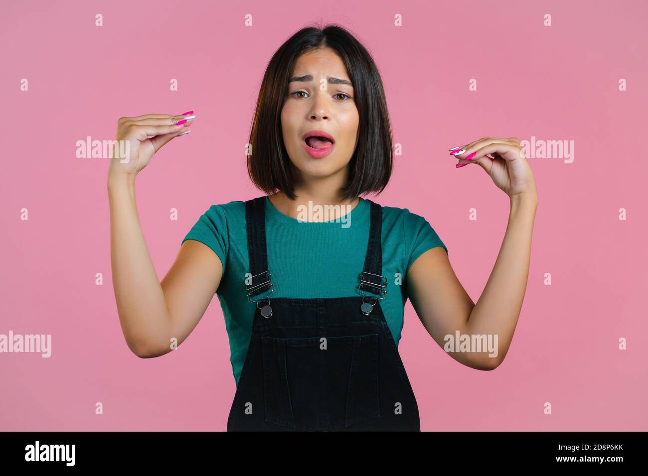 Cute girl showing blablabla gesture with hands and rolling eyes