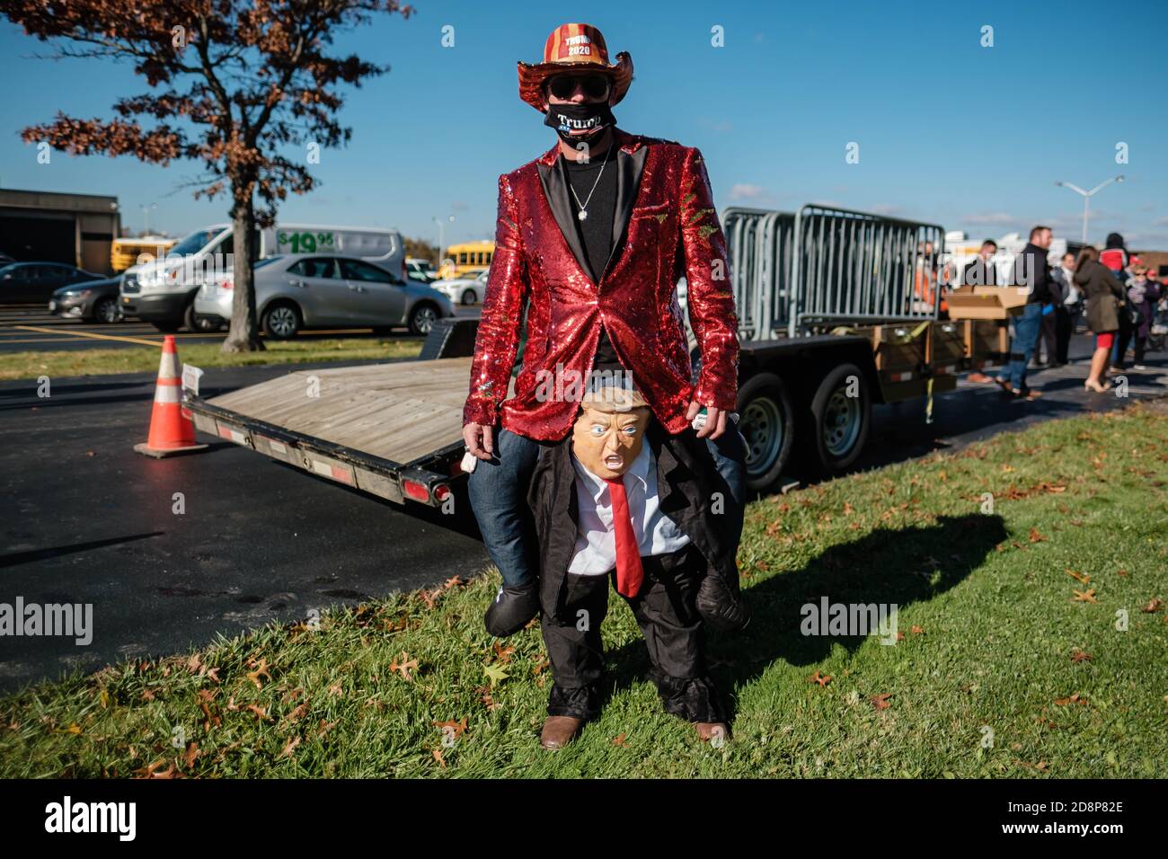 Canfield, Ohio, USA. 31st Oct, 2020. THOMAS VIGARINO, of Girard, Ohio shows off his Halloween costume during a Make America Great Again event with Ivanka Trump outside the Mahoning County Career and Technical Center. Mr Vigarino had this to say about his costume: 'Trump is carrying me, and I'm carrying him for the country.' Credit: Andrew Dolph/ZUMA Wire/Alamy Live News Stock Photo