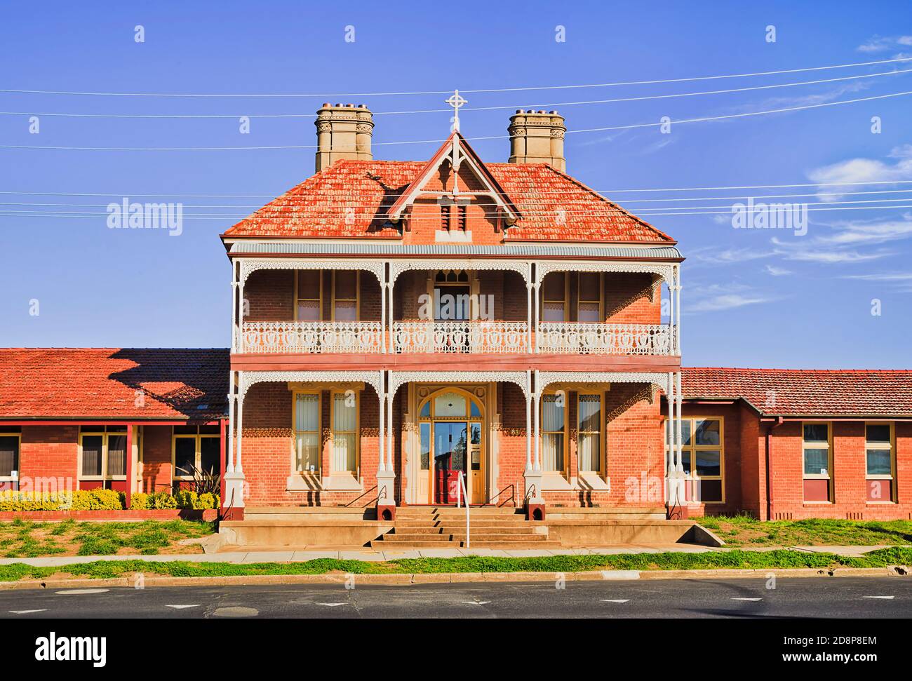 George street in Bathurst city of Australia - historic brick house facade along the road. Stock Photo