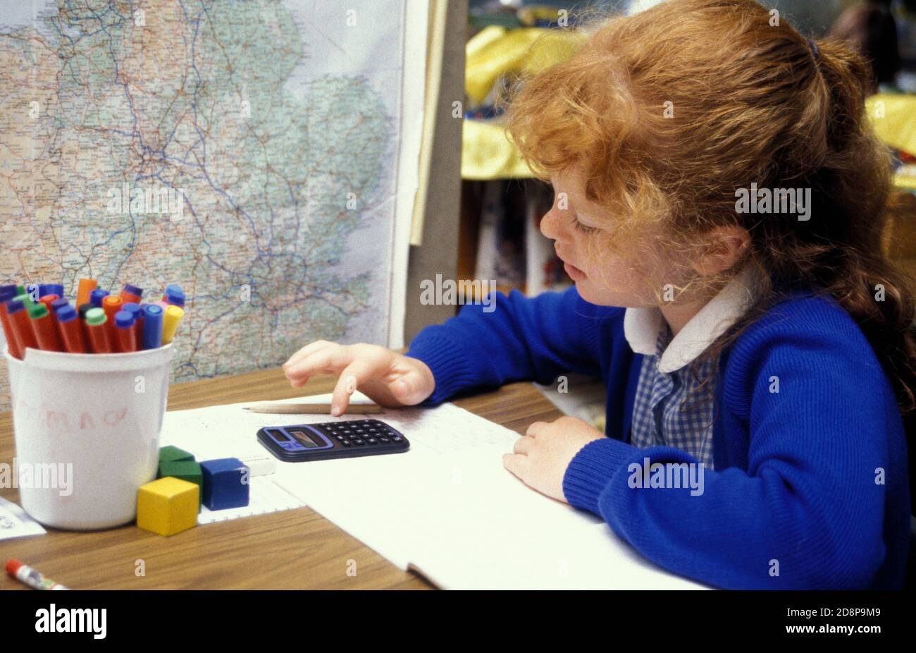 Kids using calculator class hires stock photography and images Alamy