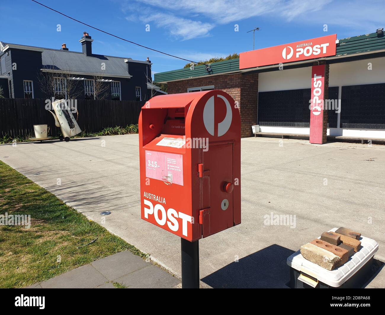 Red Post Box Aussie SOUTHERN HIGHLANDS, AUSTRALIA - Sep 13, 2020: Red box ubicated in ...