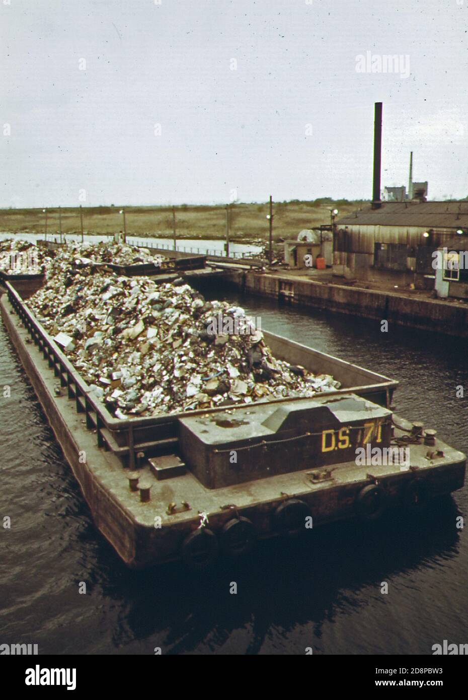 Garbage scow at Fresh Kills on Staten Island ready for unloading. Waste