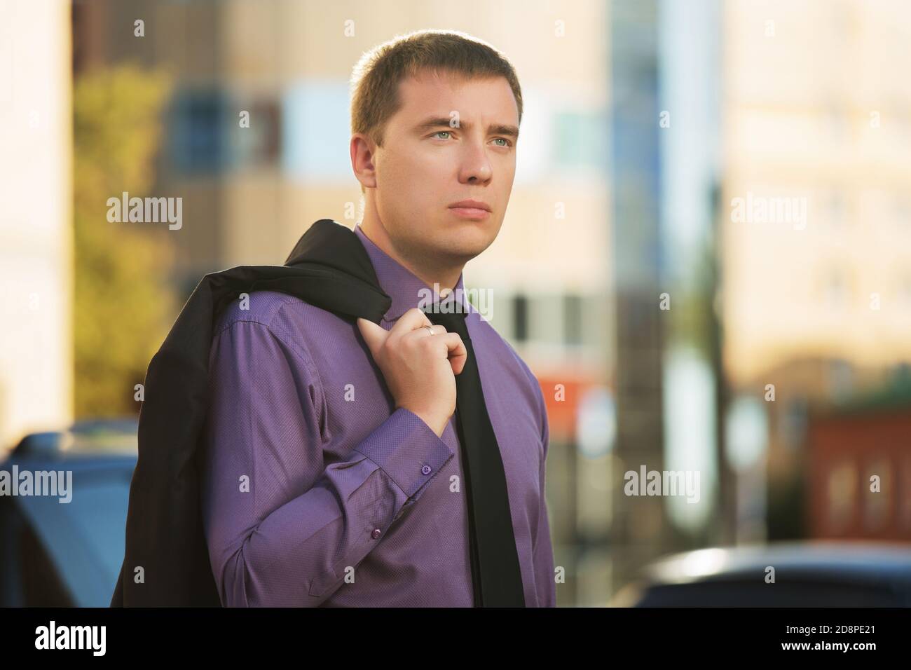 Young black man walking outside hi-res stock photography and images - Alamy