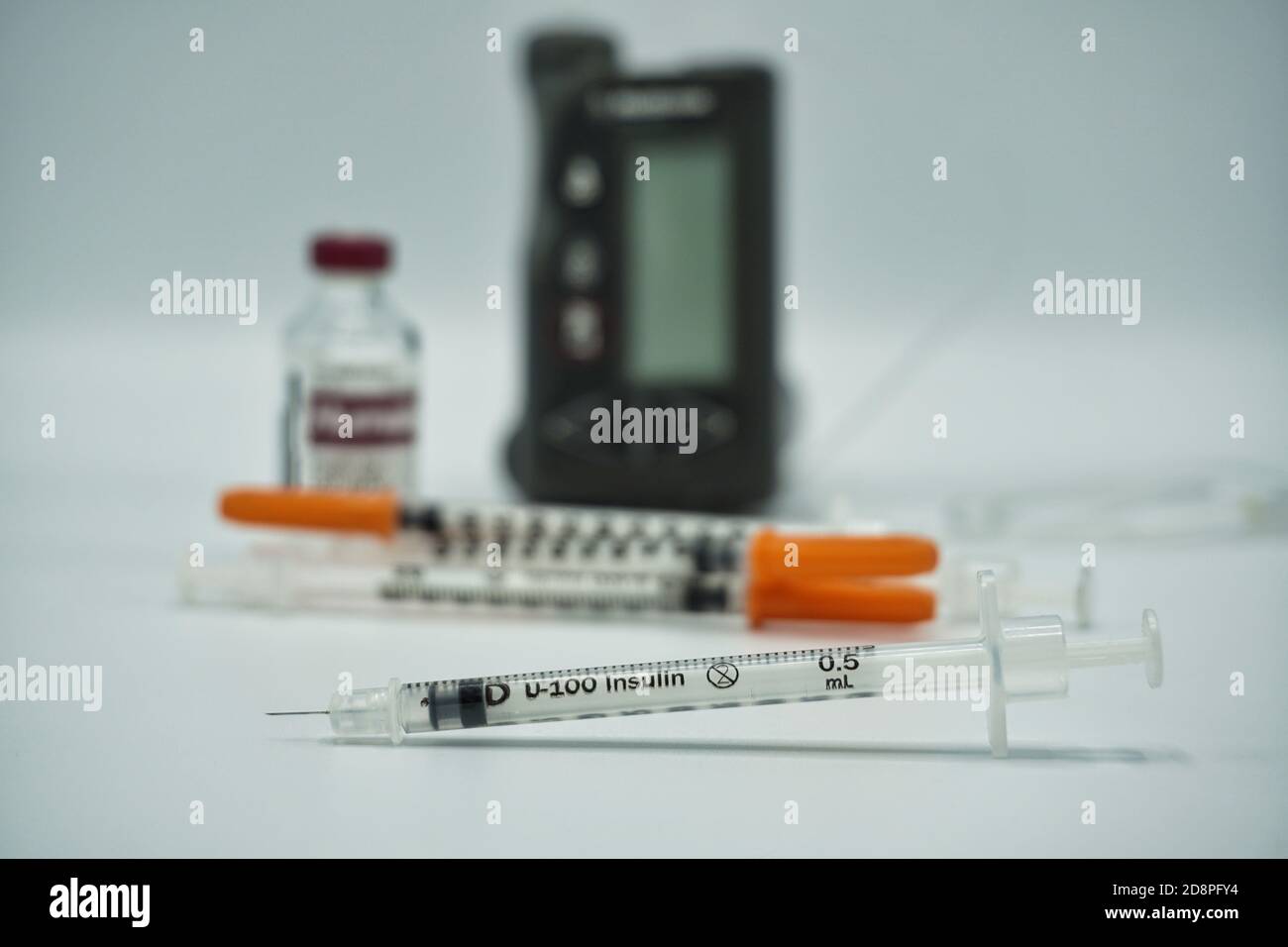 insulin bottle, disposable syringes, pump, blood glucose monitoring for