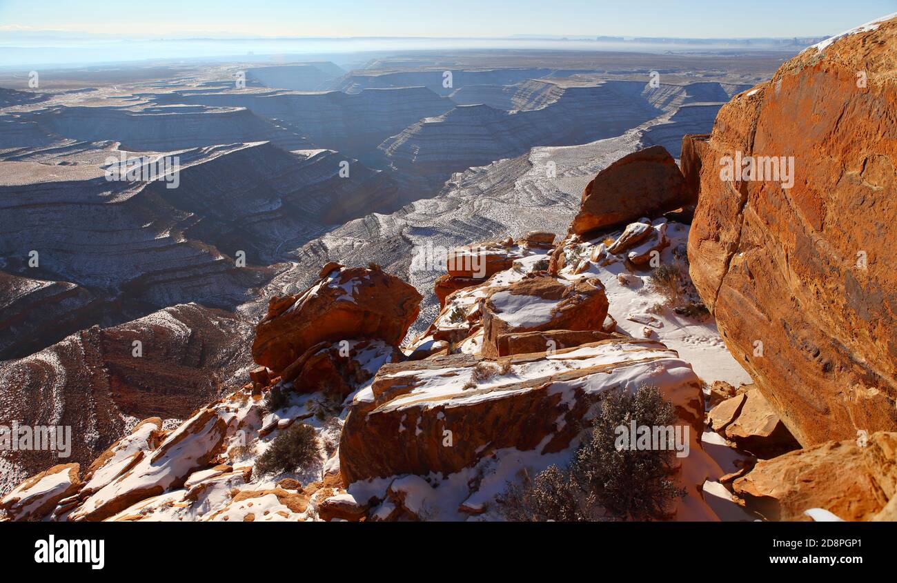 Muley Point panoramic overlook with red sandstone in foreground, early winter morning with magic light. USA, Utah. Stock Photo