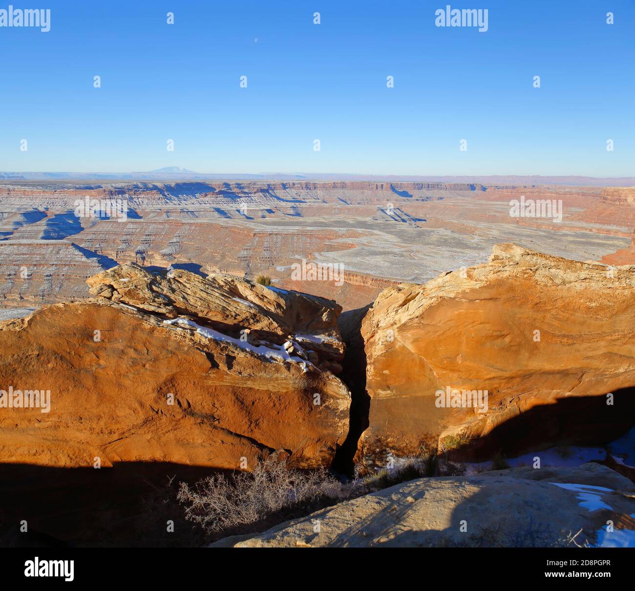 Muley Point panoramic overlook with red sandstone in foreground, early winter morning with magic light. USA, Utah. Stock Photo