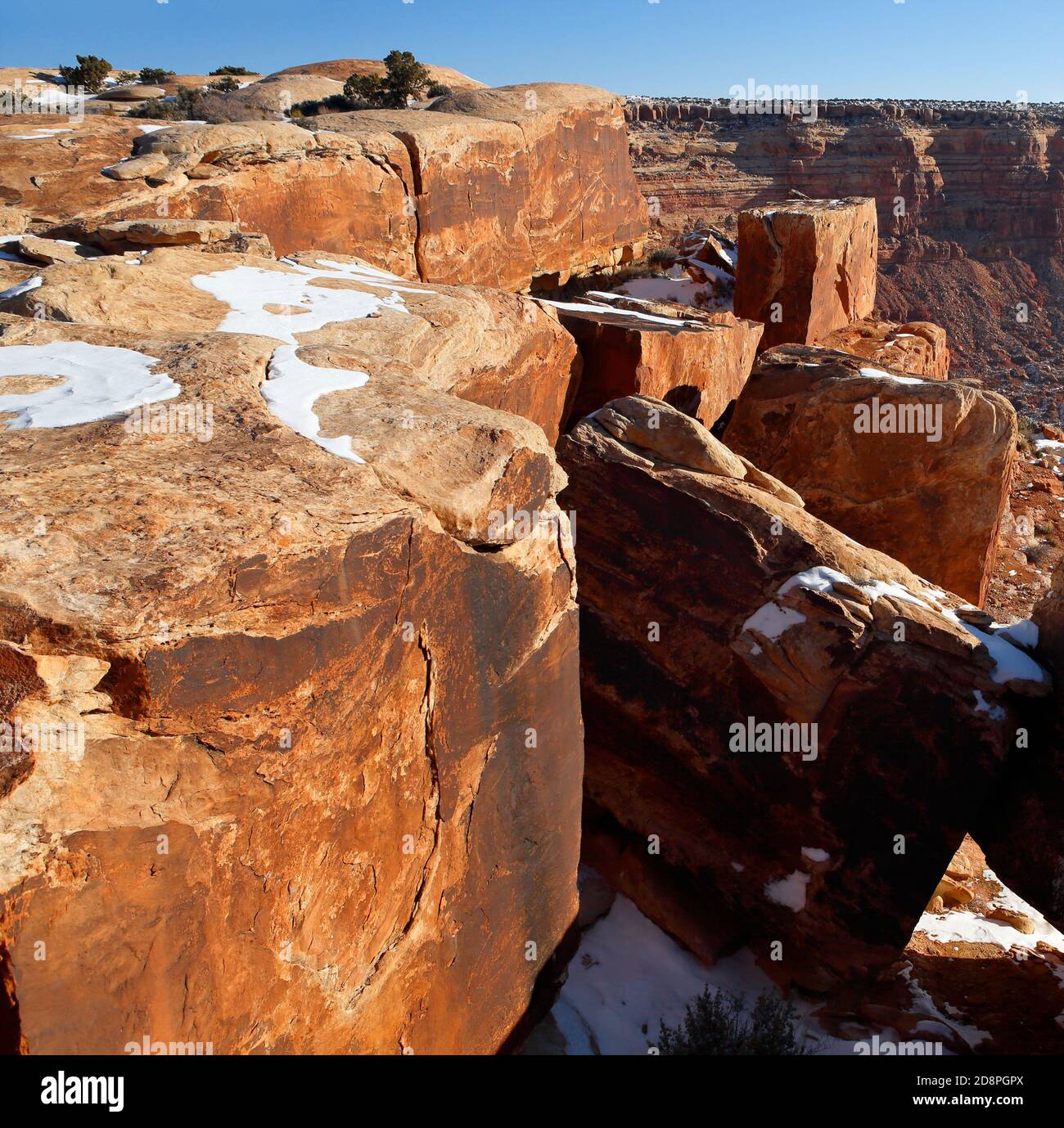 Muley Point panoramic overlook with red sandstone in foreground, early winter morning with magic light. USA, Utah. Stock Photo