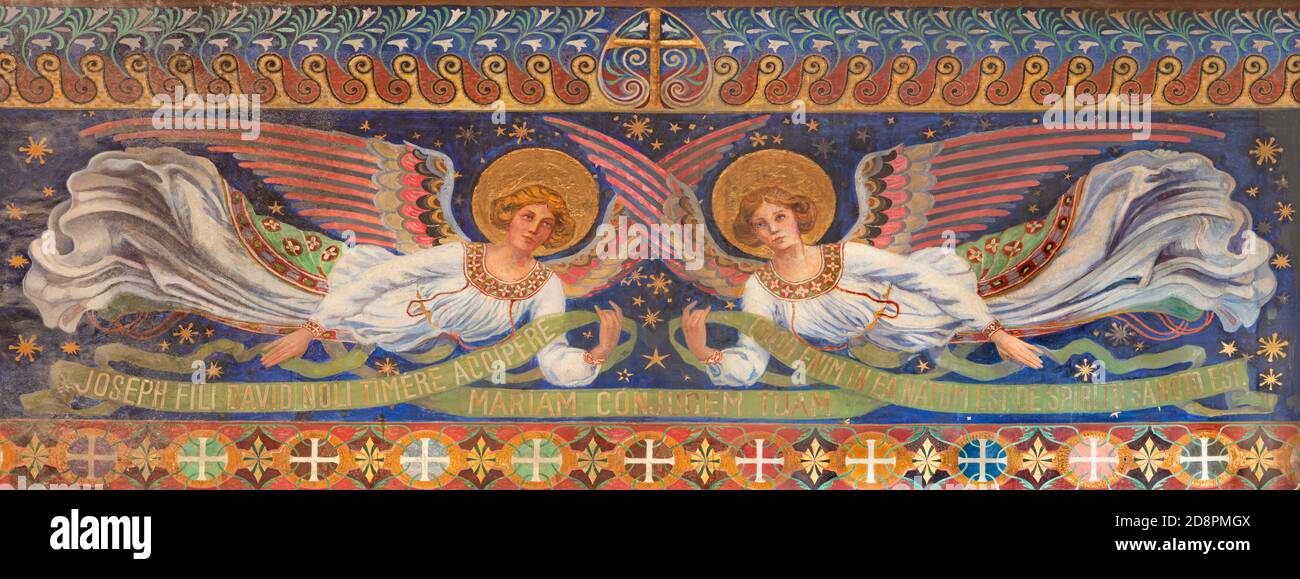 VIENNA, AUSTIRA - OCTOBER 22, 2020: The freso of angels in church Pfarrkirche Kaisermühlen. Stock Photo