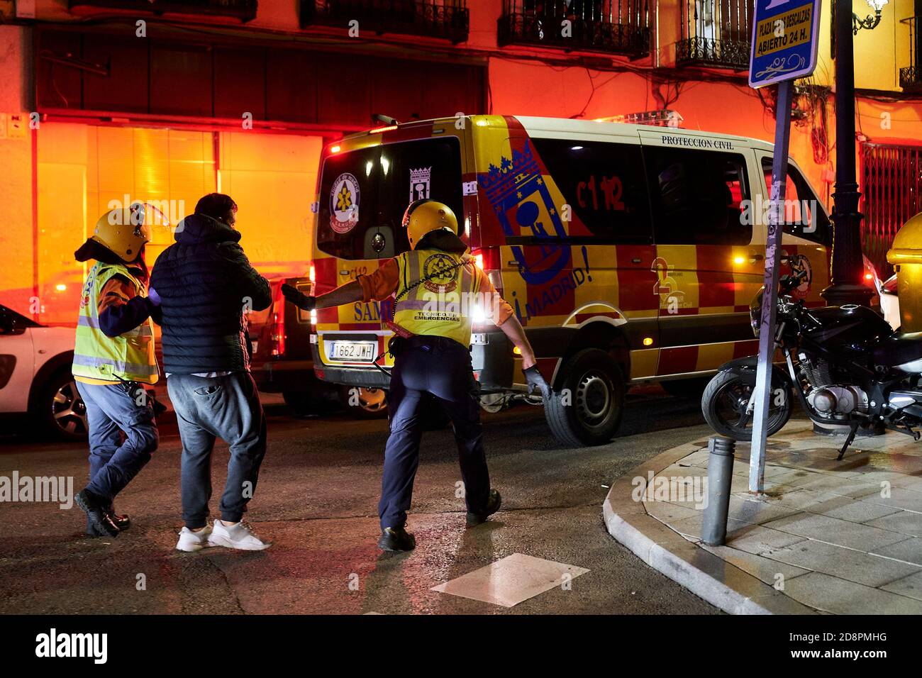 Madrid, Spain. 01 November, 2020: An injured man is conduced to an ...
