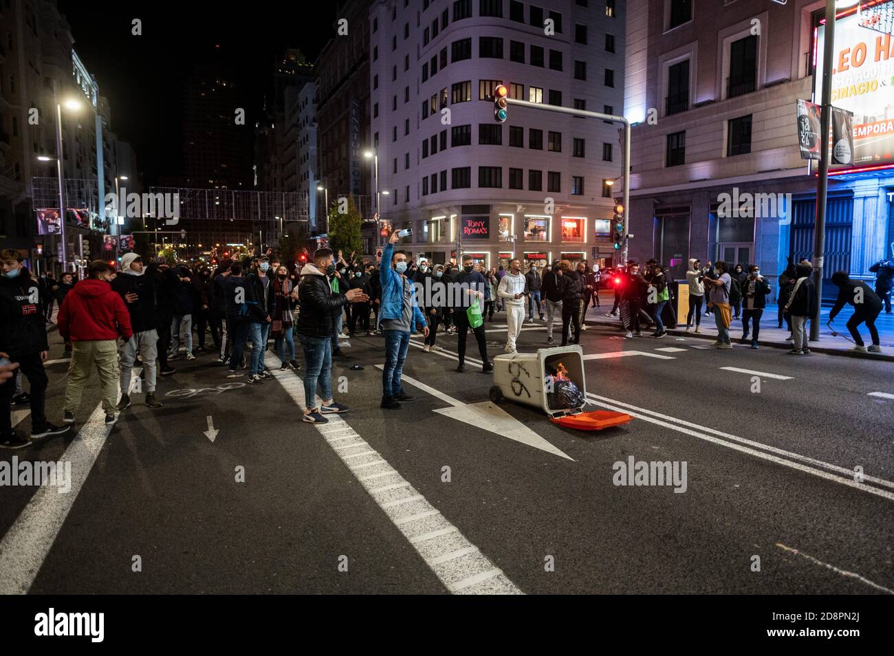 Madrid, Spain. 01st Nov, 2020. Protesters shouting at riot police ...