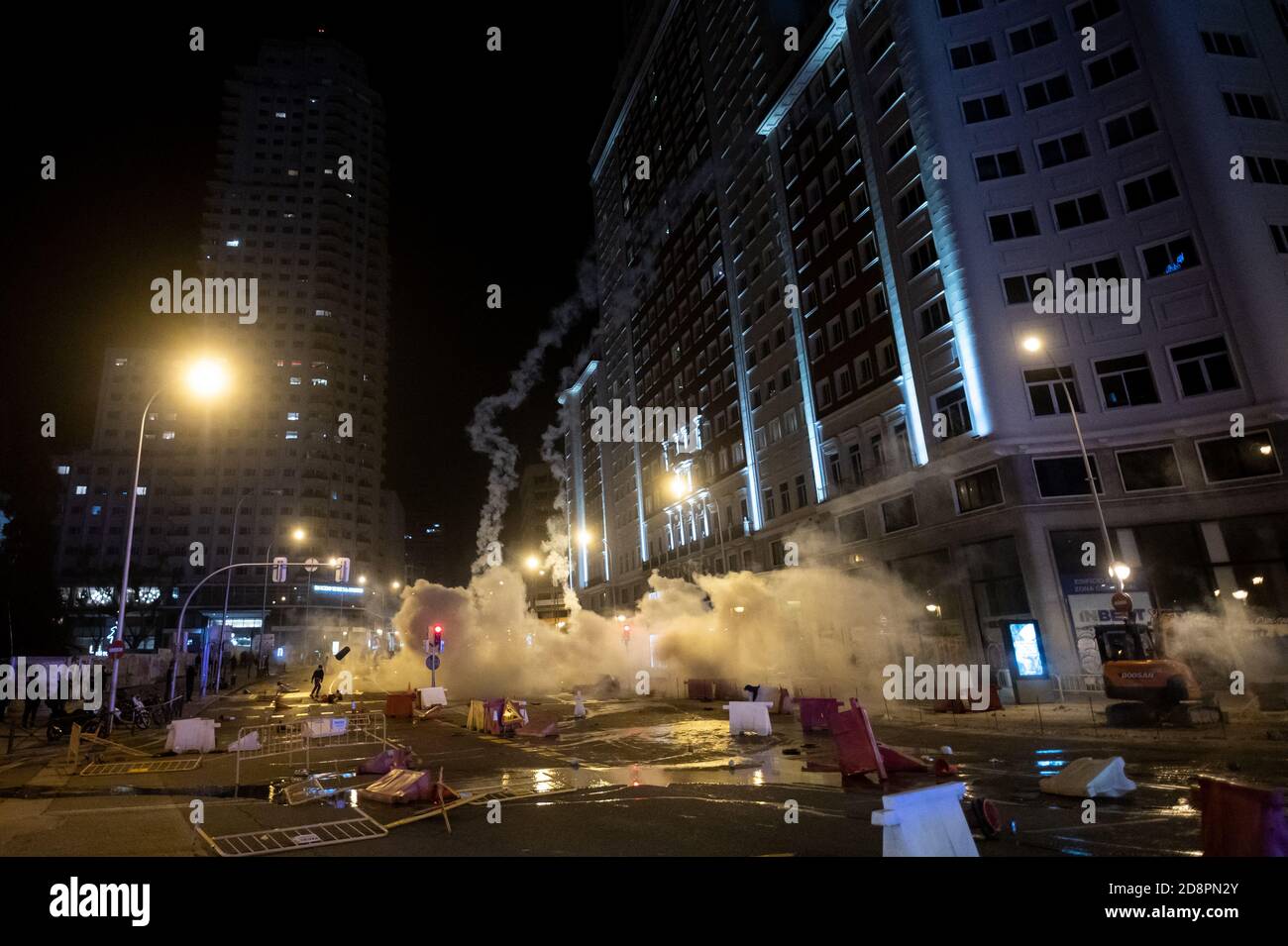 Madrid, Spain. 01st Nov, 2020. Gas fired by riot police during a ...