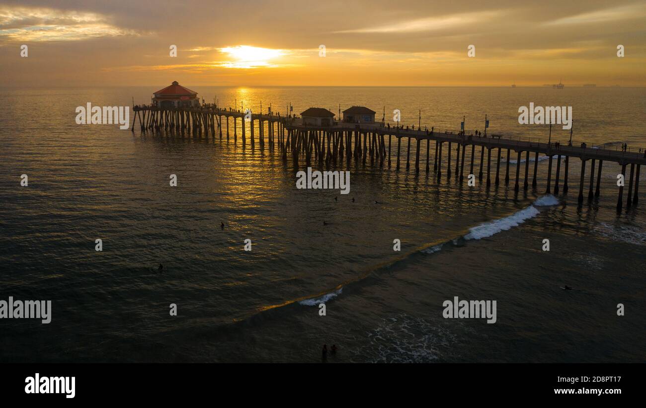 Sun reflections and pier at sunset, California US Stock Photo