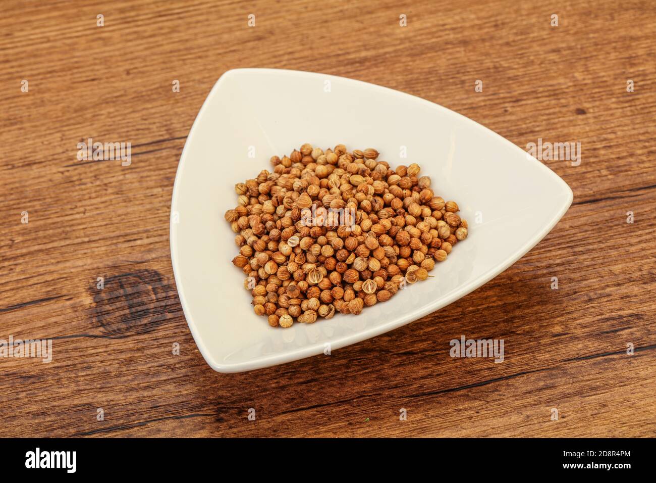 Dry Coriander seeds in the bowl Stock Photo Alamy