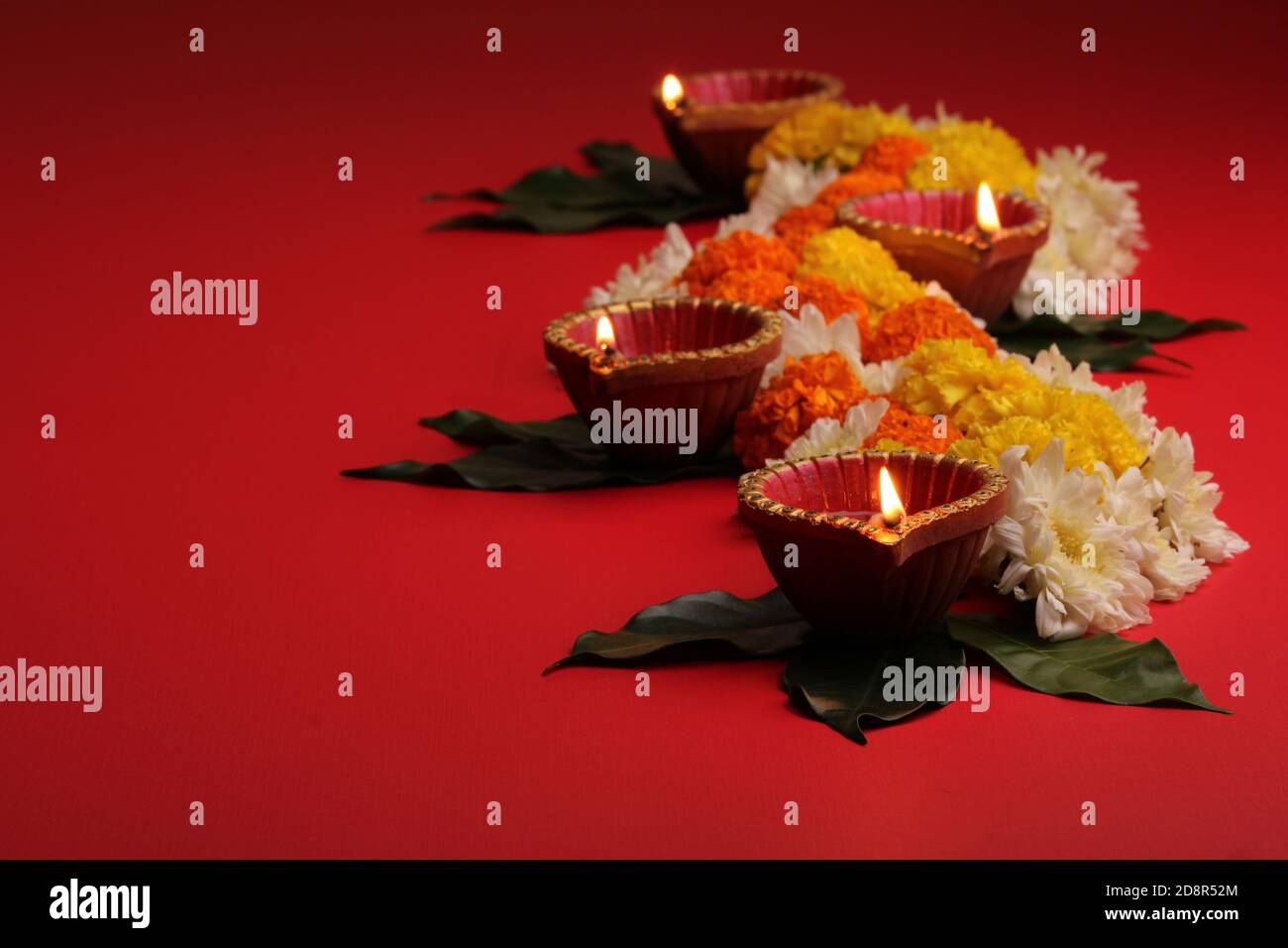 Flower Rangoli for Diwali or Pongal Festival made using Marigold or