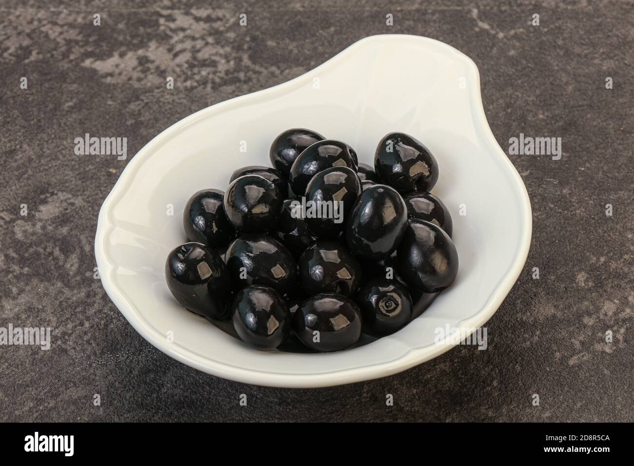 Marinated Black olives in the bowl Stock Photo Alamy