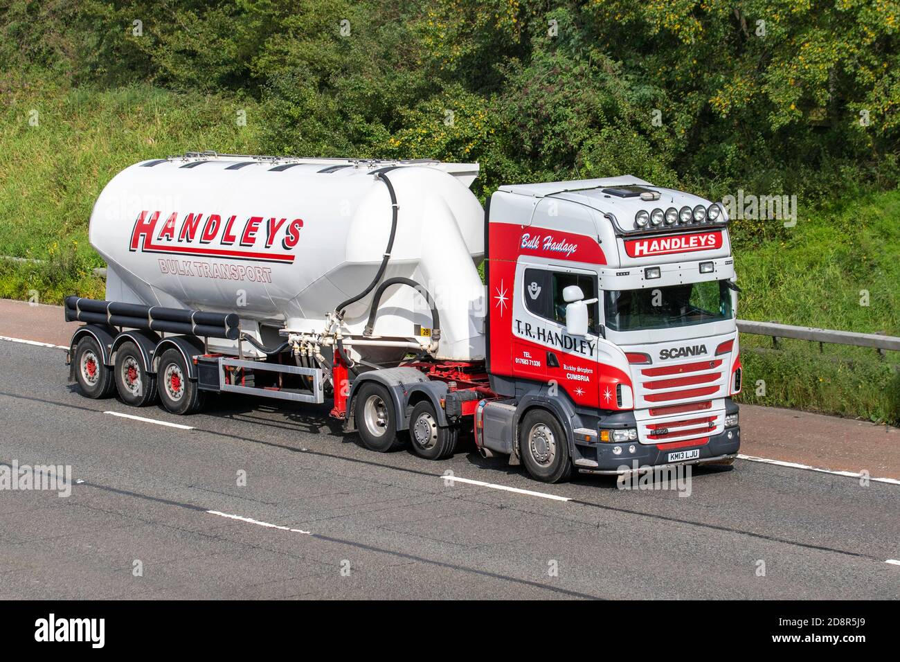 T R Hanley Bulk Haulage delivery trucks, lorry, heavy-duty vehicles,transportation, truck, cargo carrier, Scania R500 vehicle, European commercial transport industry HGV, M6 at Manchester, UK Stock Photo