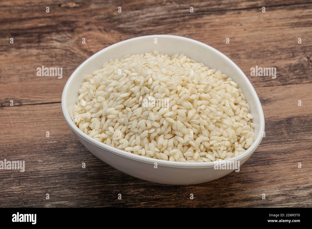 Raw Italian arborio rice for Risotto Stock Photo - Alamy
