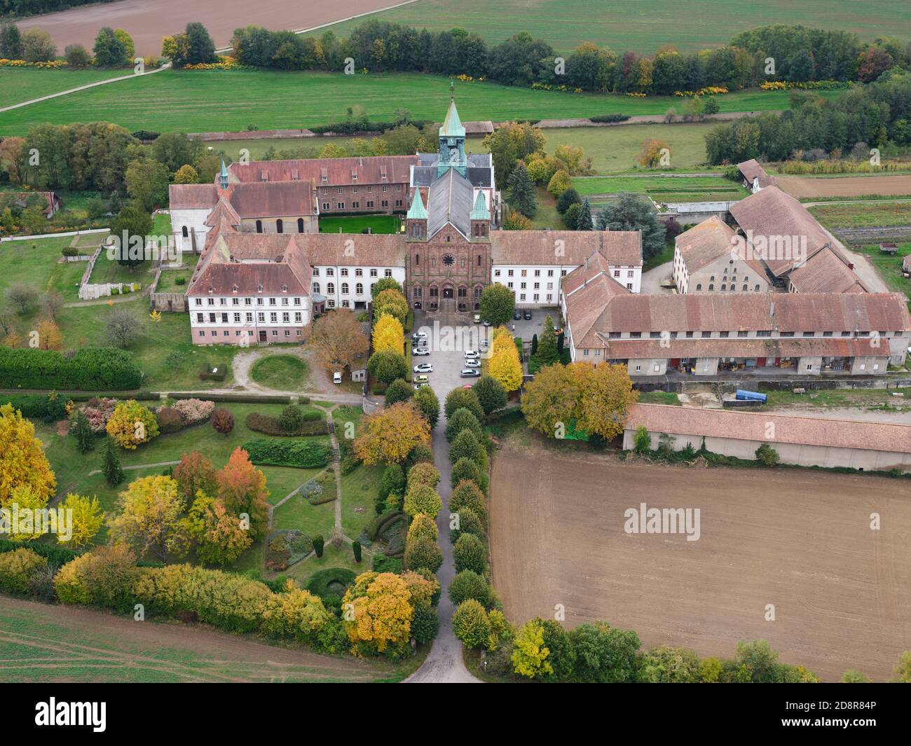 AERIAL VIEW. Abbey of Notre-Dame d'Oelenberg in the fall. Reiningue, Haut-Rhin, Alsace, Grand Est, France. Stock Photo