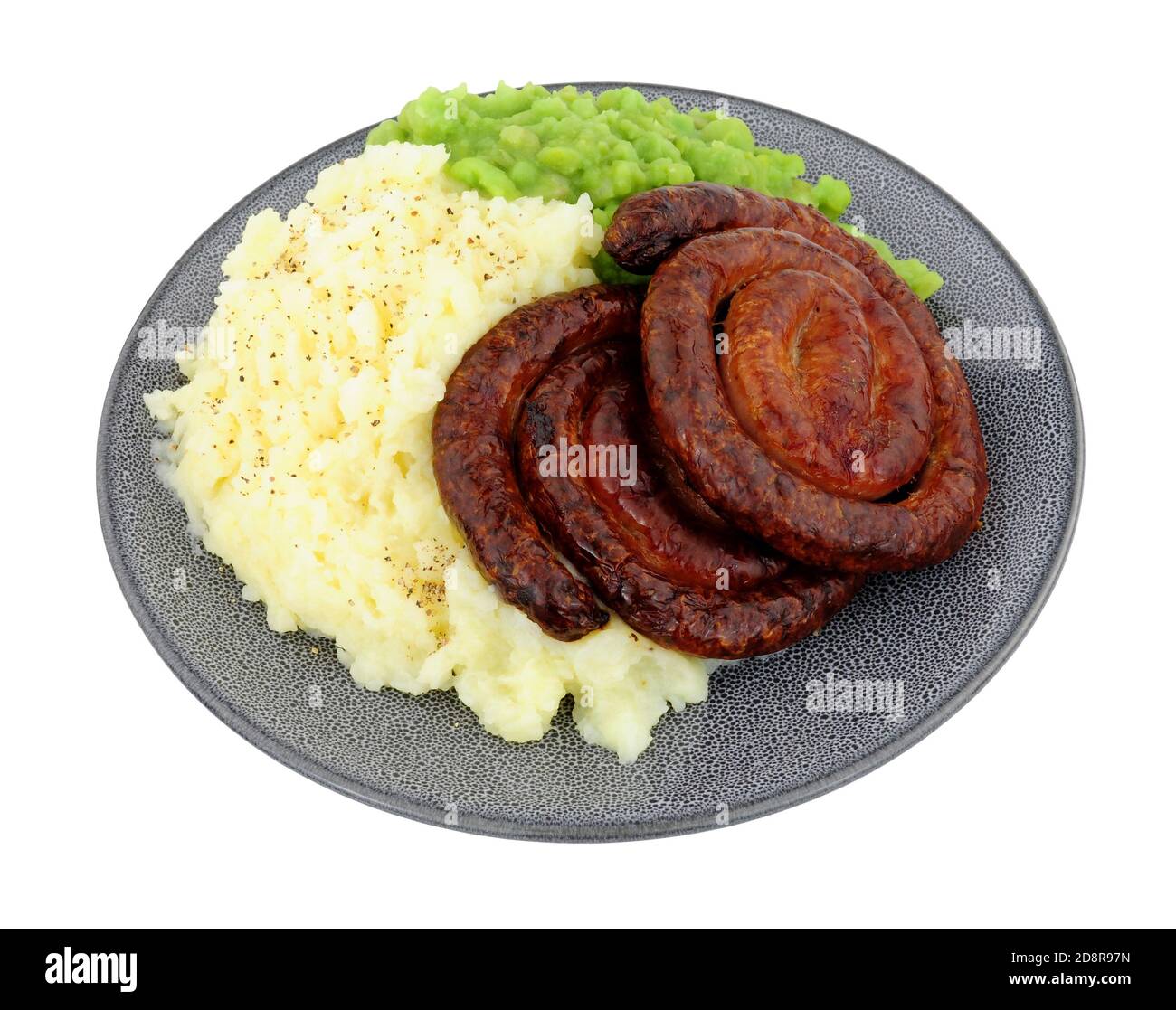 Cumberland pork sausage swirl and mashed potato meal with mushy peas