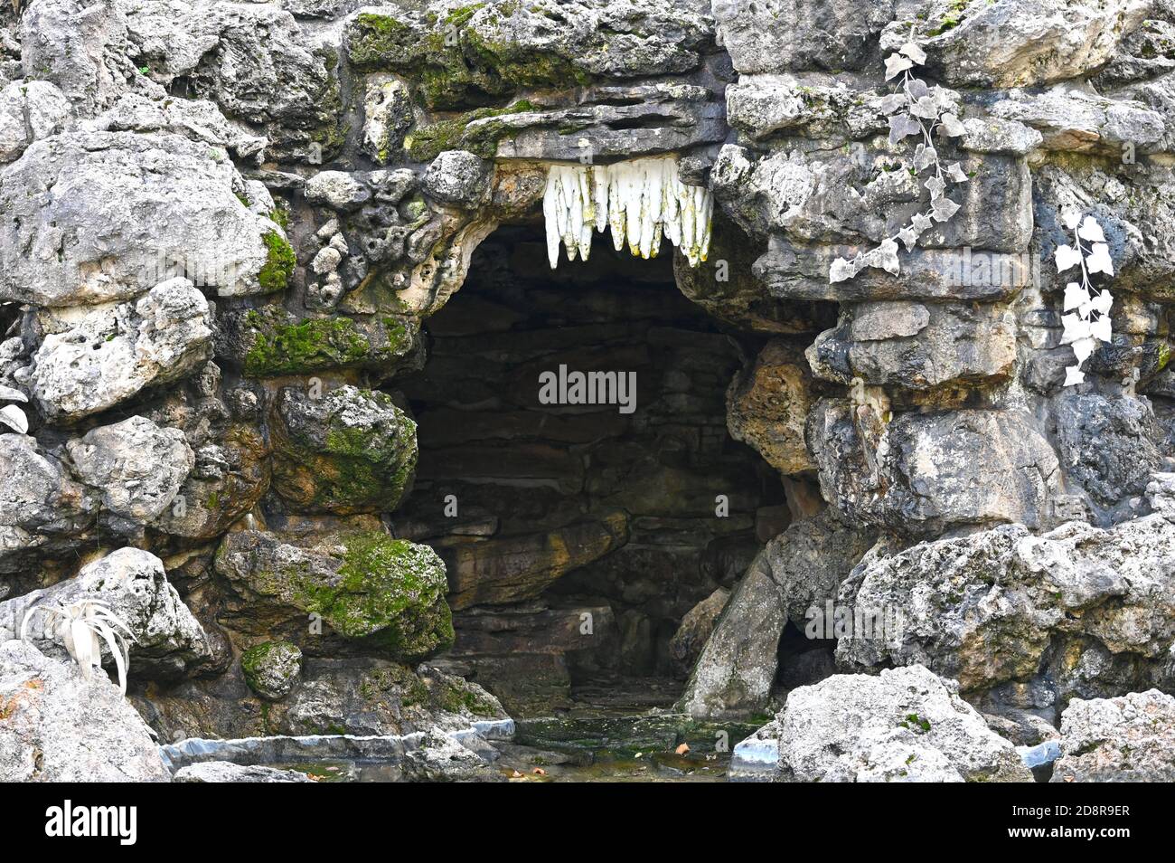 entrance to a old stone cave Stock Photo Alamy