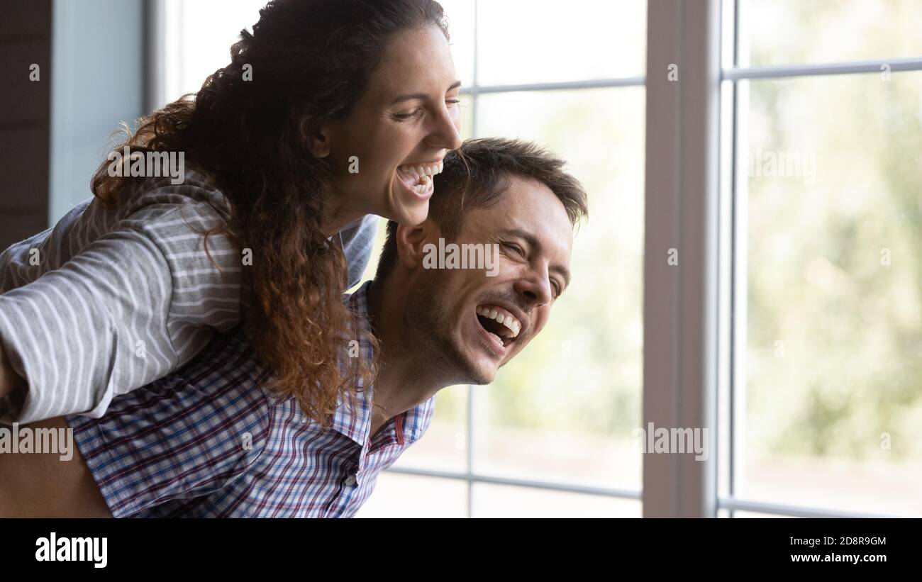 Banner view of happy couple have fun at home Stock Photo