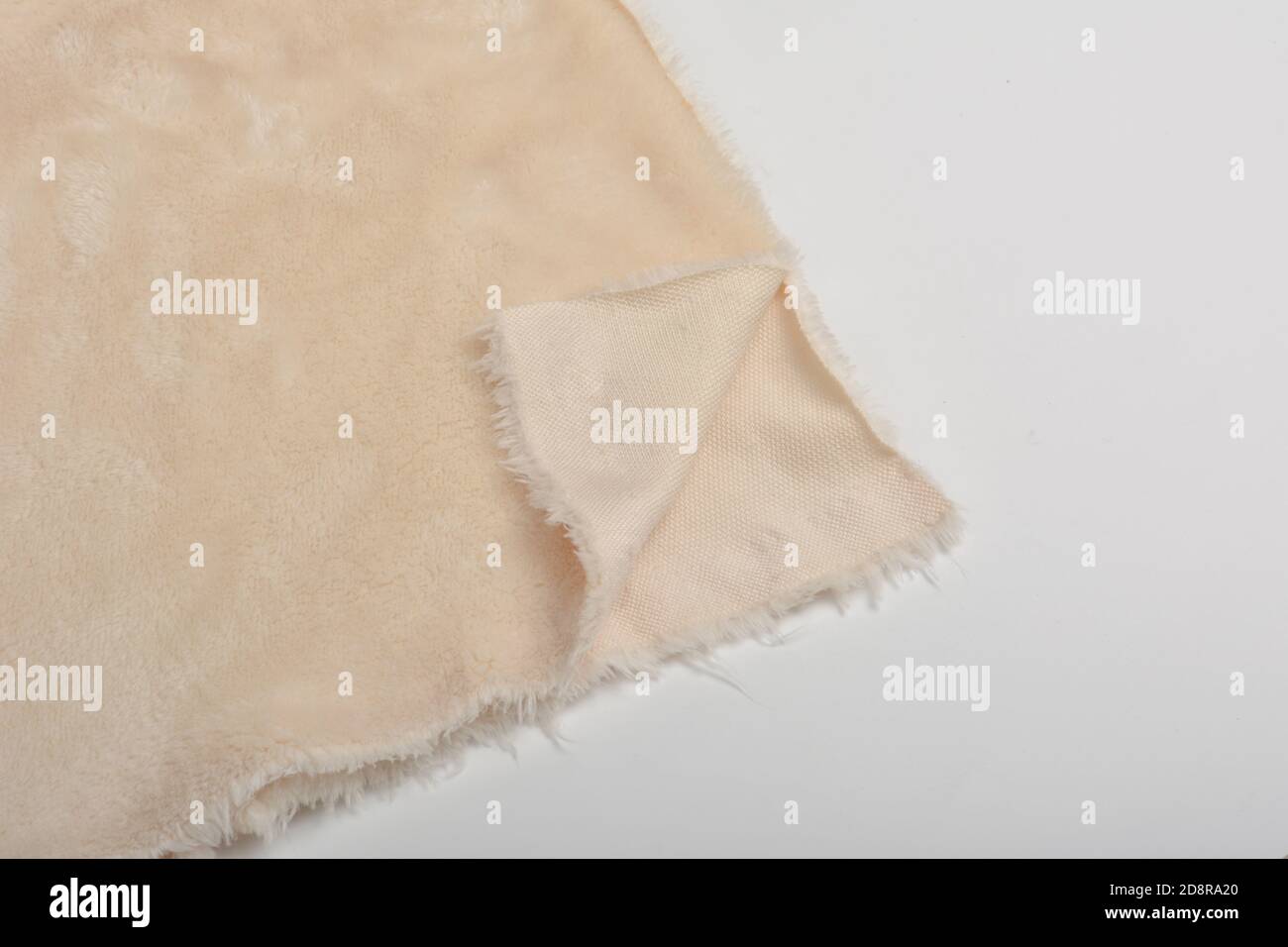 Abstract Artificial texture fur fabric, background, closeup. Fluffy material backdrop, kids toys faux fur. Stock Photo