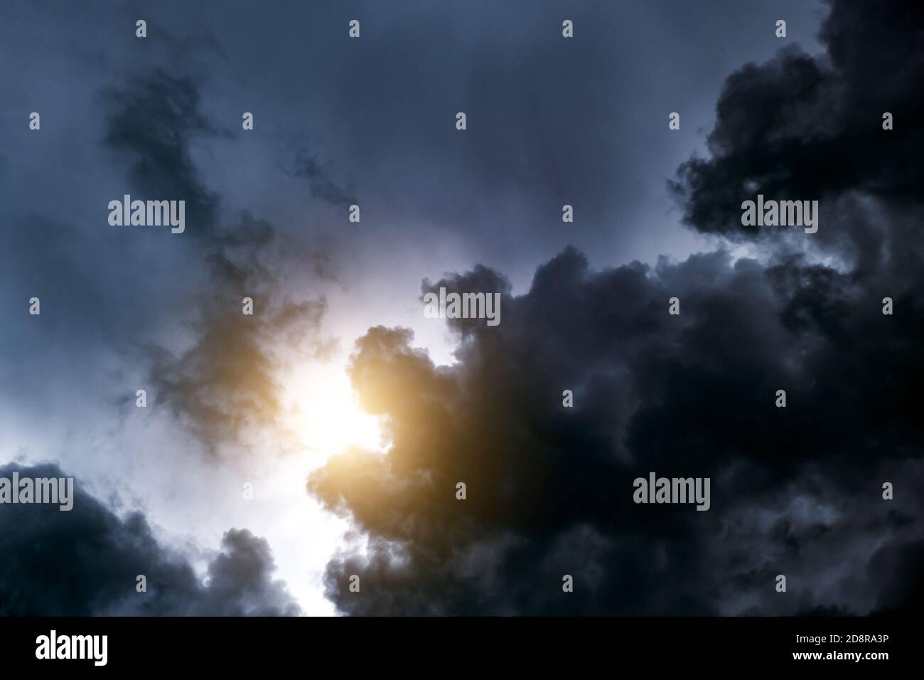 Light in the Dark and Dramatic Storm Clouds Stock Photo - Alamy