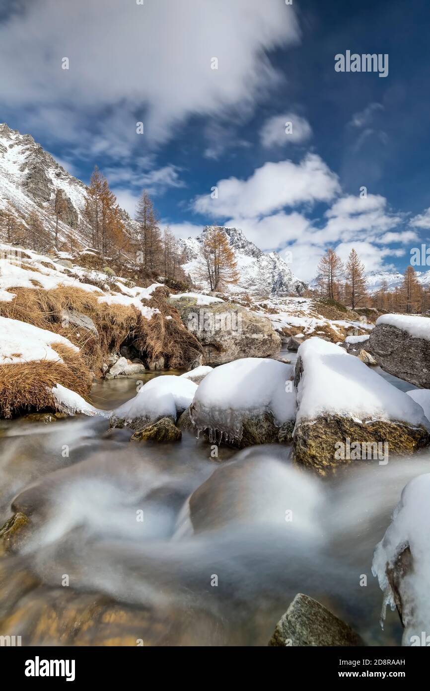Rushing river in Alps mountains Stock Photo - Alamy