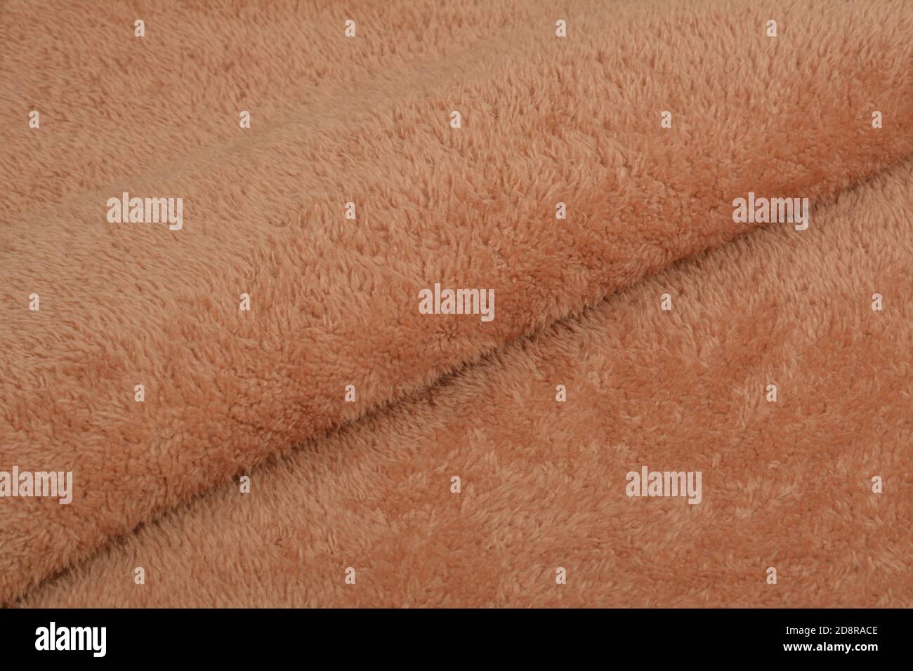 Abstract Artificial texture fur fabric, background, closeup. Fluffy material backdrop, kids toys faux fur. Stock Photo