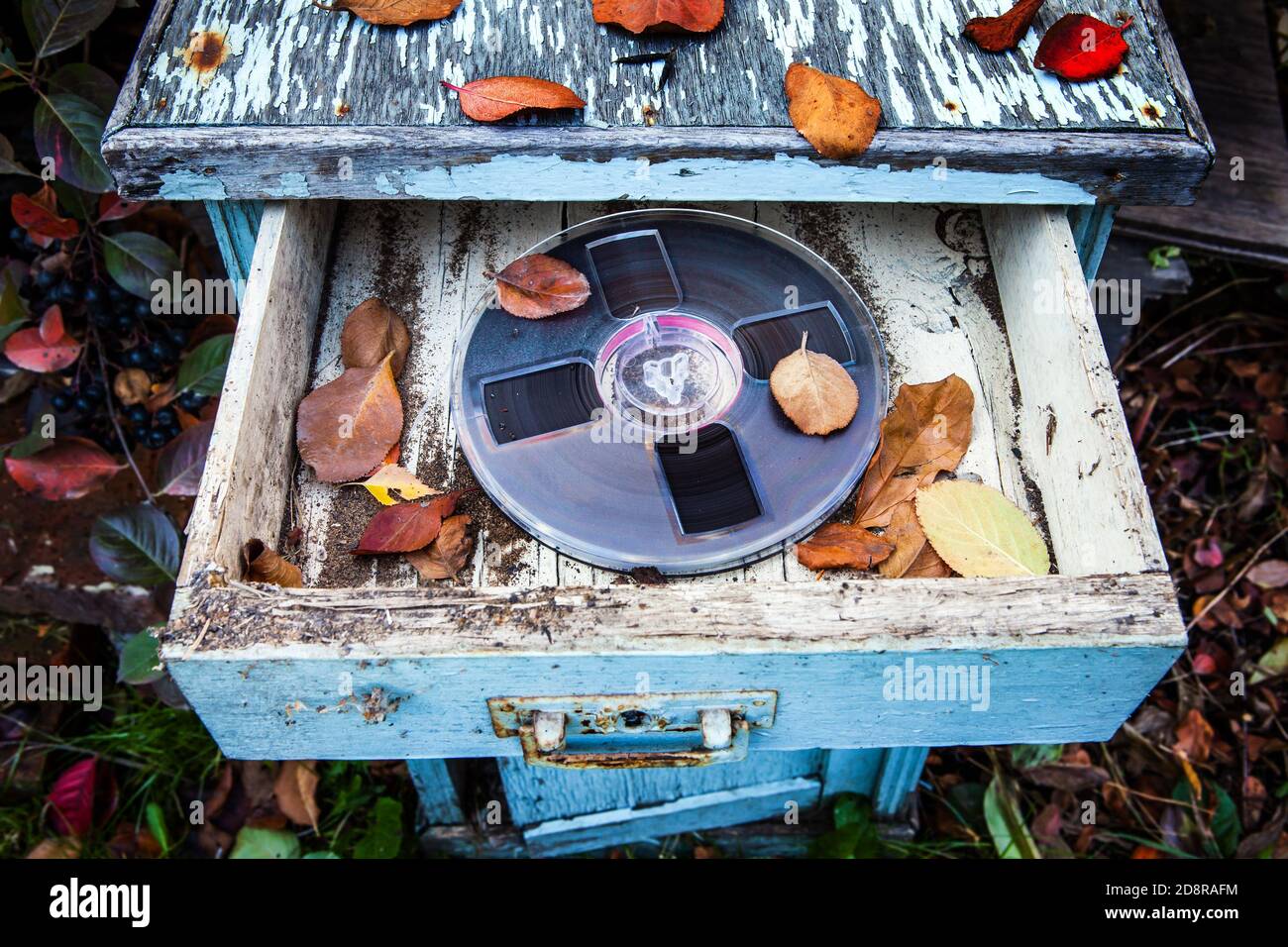 Reel to Reel Tape in the Old Wardrobe and Dirty Furniture Stock Photo