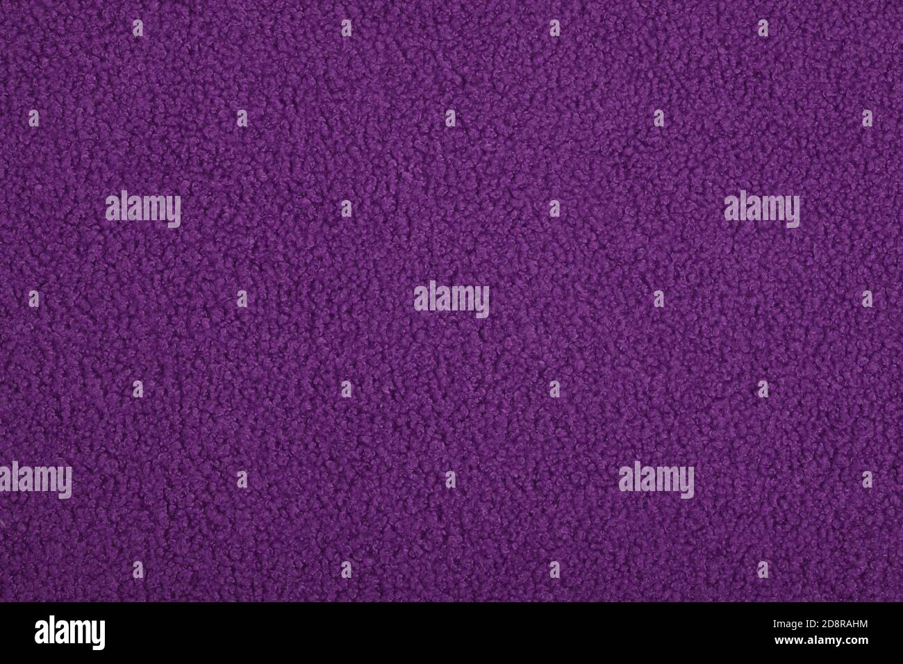 purple Abstract Artificial texture fur fabric, background, closeup. Fluffy material backdrop, kids toys faux fur. Stock Photo
