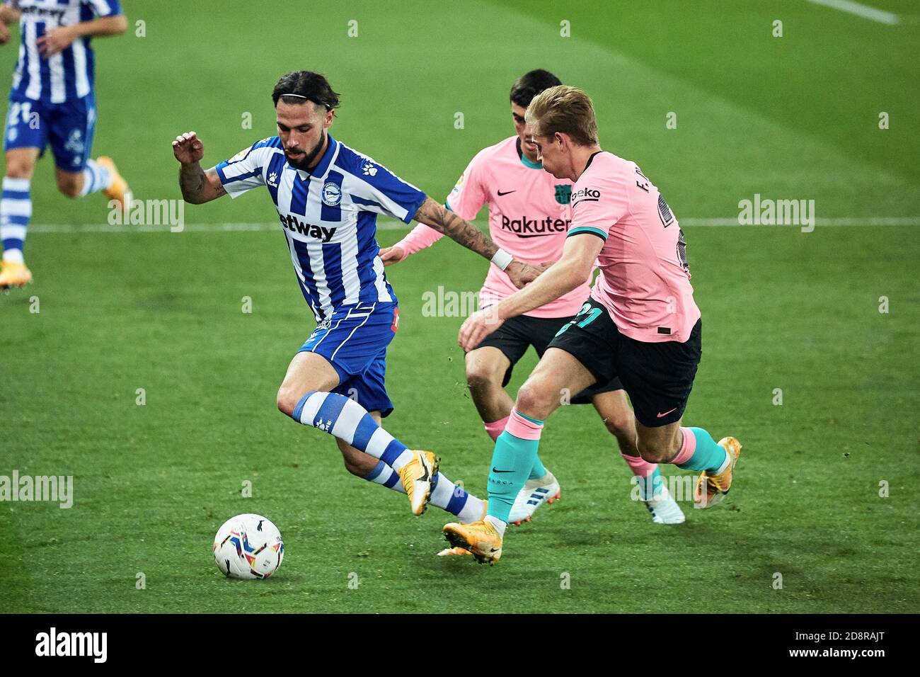 Jota Peleteiro Of Cd Alaves And Pedri Gonzalez Frankie De Jong Of Fc Barcelona During The Spanish Championship La Liga Football Match Between Cd Al C Stock Photo Alamy