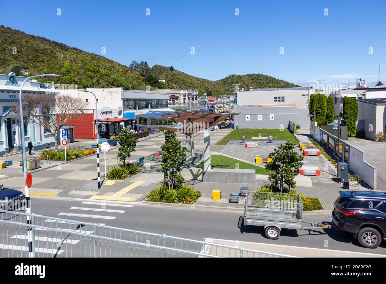 Small town in New Zealand with commercial buildings parks roads and