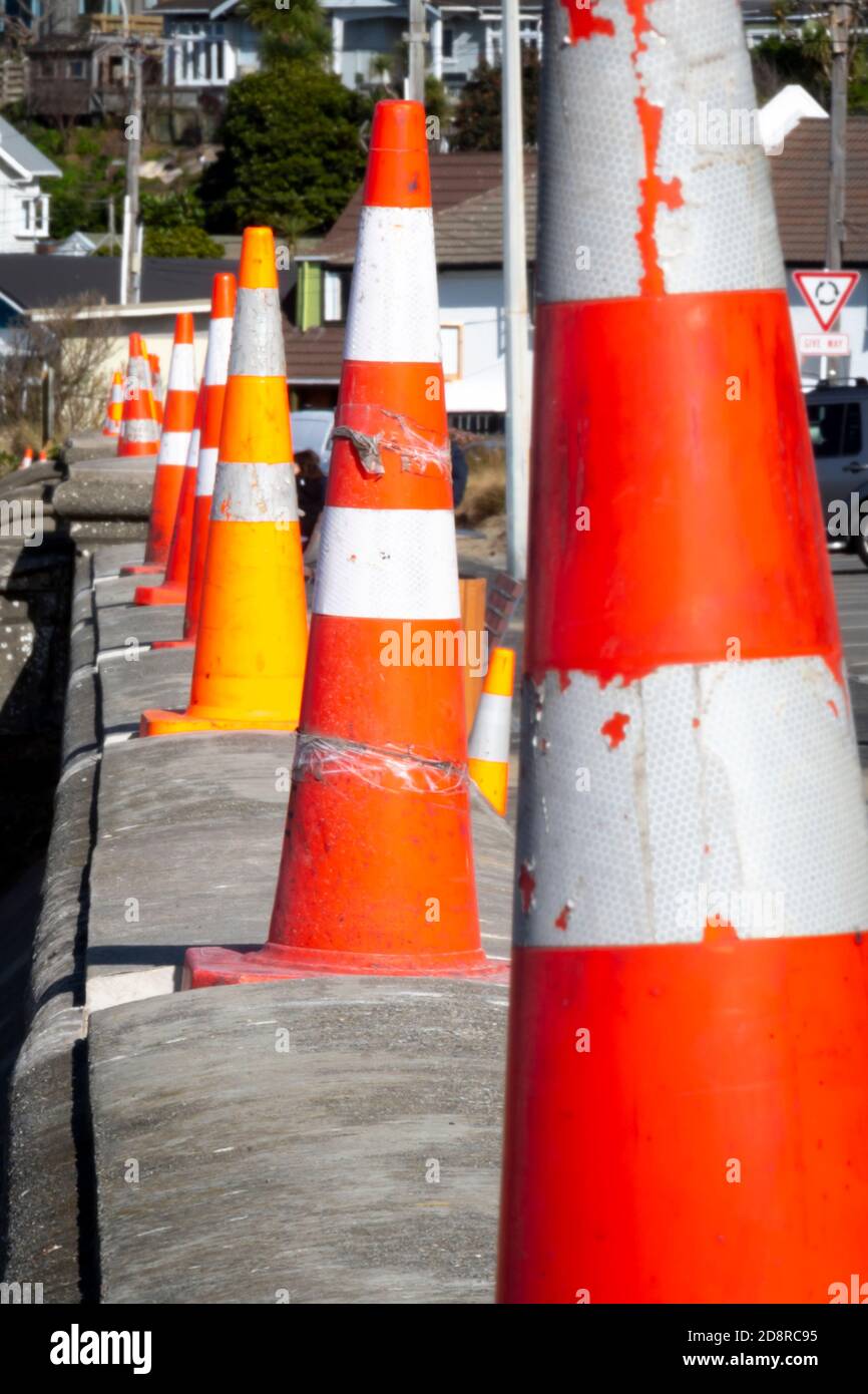 Row of road cones, Lyall Bay, Wellington, North Island, New Zealand Stock Photo