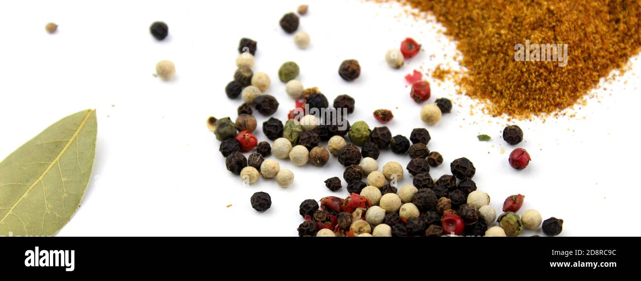 Colourful various herbs and spices for cooking on white background. Stock Photo