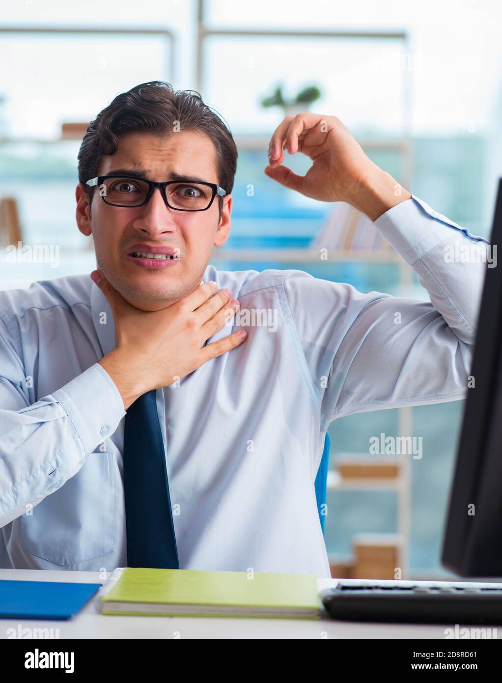 The businessman suffering from excessive armpit sweating Stock Photo Alamy