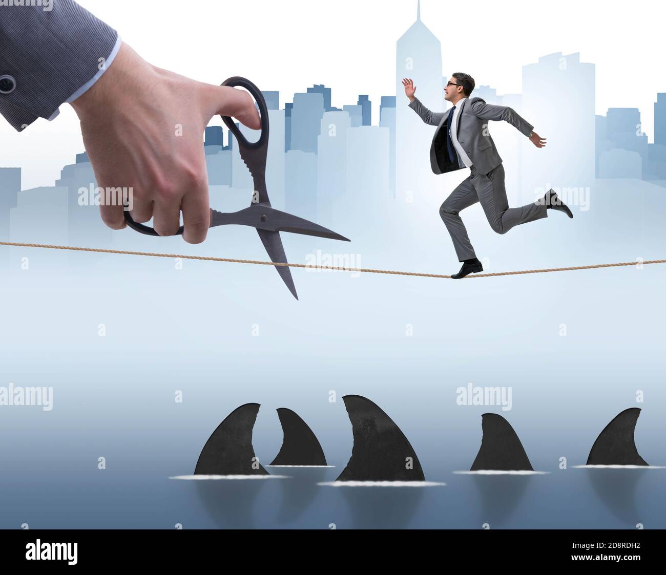 Hand Cutting Rop The hand cutting rope in business risk concept Stock Photo - Alamy