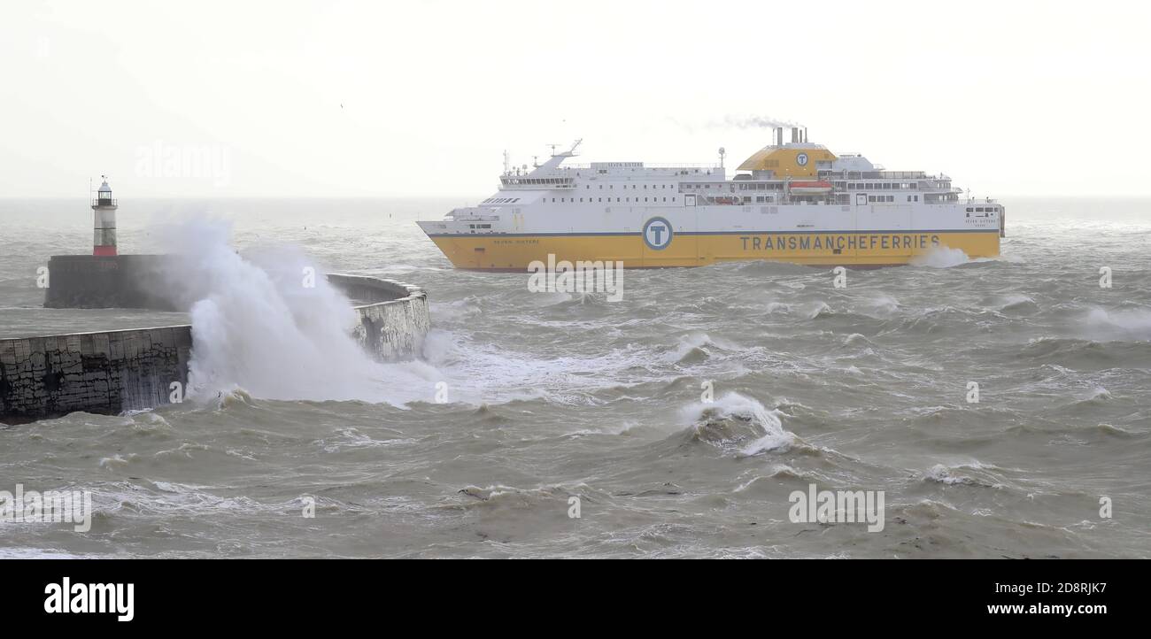 Newhaven, UK. 01st Nov, 2020. Massive waves hit the harbour wall as the Newhaven to Dieppe ferry departs into the high seas this morning. Credit: James Boardman/Alamy Live News Stock Photo