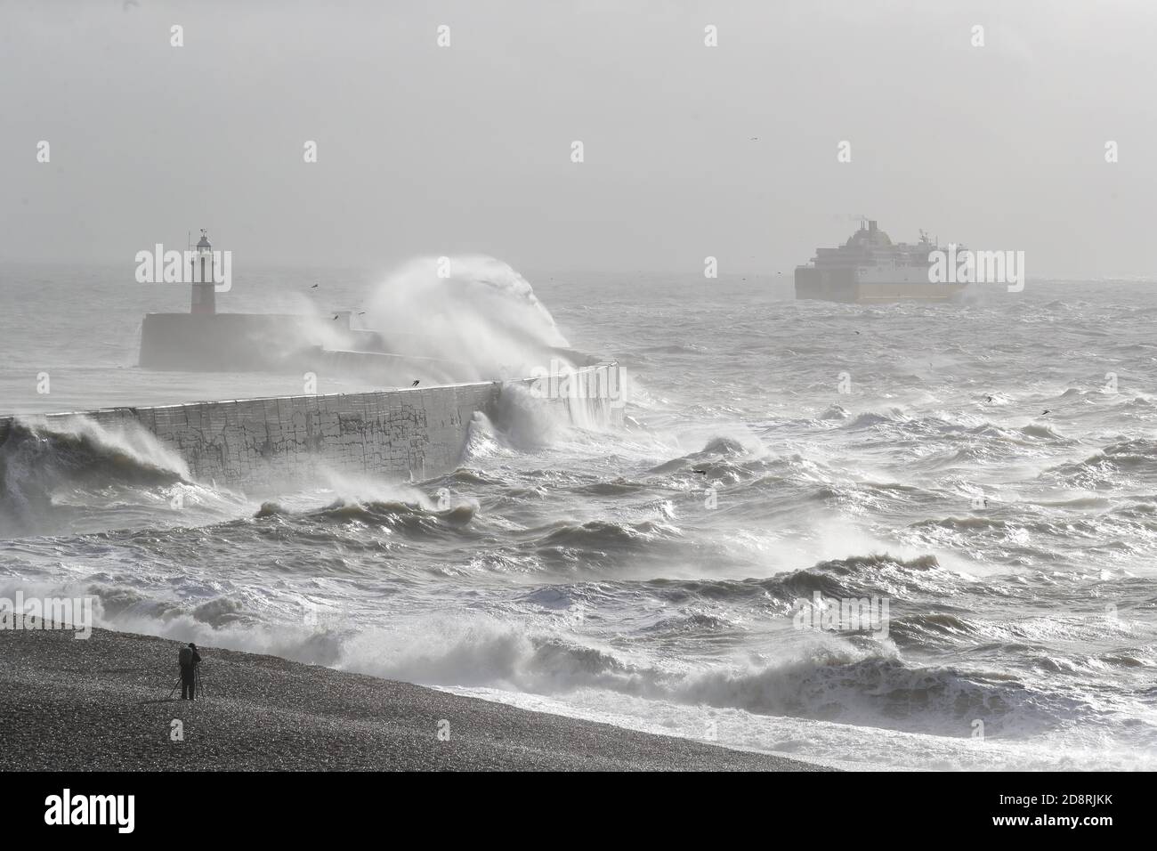 Newhaven, UK. 01st Nov, 2020. Massive waves hit the harbour wall as the Newhaven to Dieppe ferry departs into the high seas this morning. Credit: James Boardman/Alamy Live News Stock Photo
