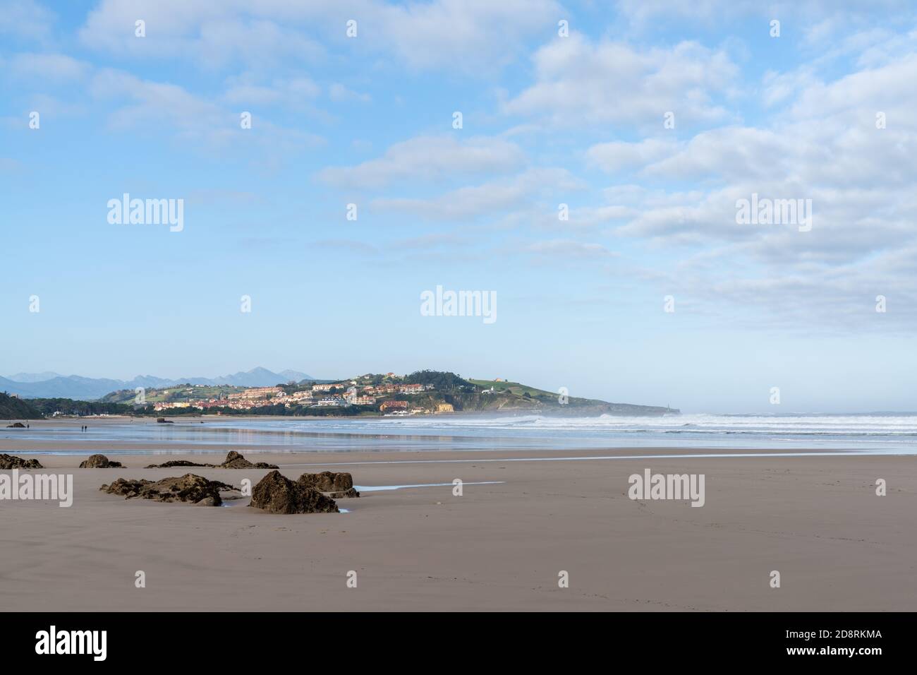 A wide and empty sandy beach on the coast of Cantabria in northern Spain Stock Photo