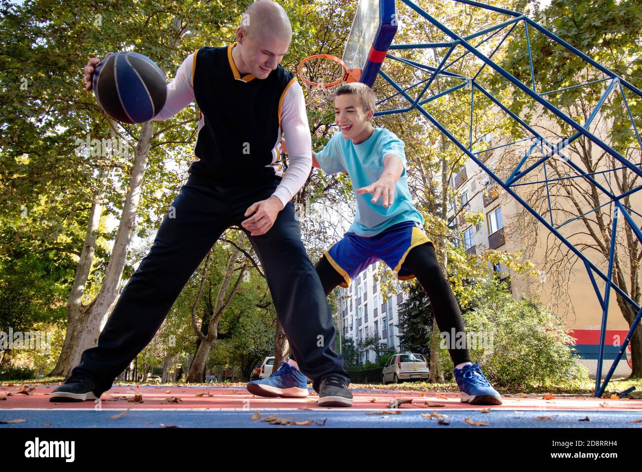 Two children playing basketball hires stock photography and images Alamy