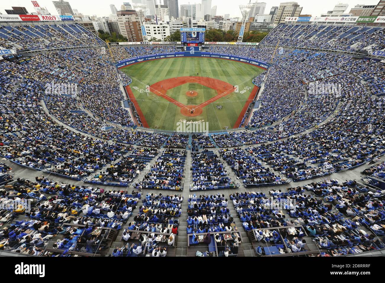 A baseball game between the DeNA BayStars and the Hanshin Tigers is played  at Yokohama Stadium on Nov. 1, 2020, the last day of a three-day trial to  study ways to mitigate