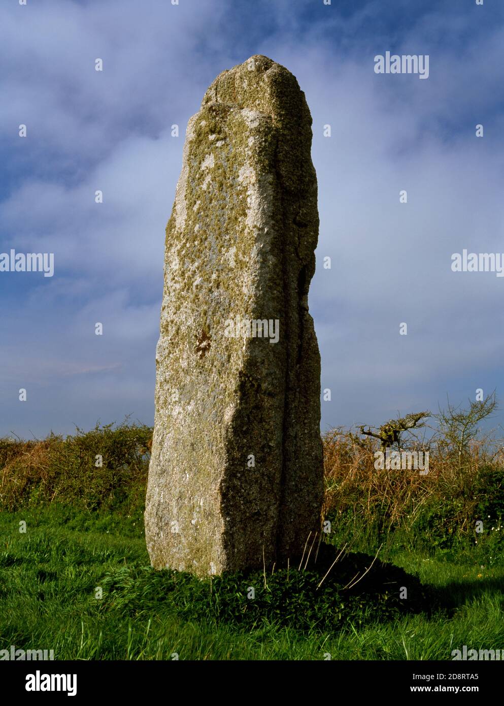 The Pipers standing stones, West Penwith, England, UK: view NW of the SW stone, at 4.6m high the tallest in Cornwall. Stock Photo