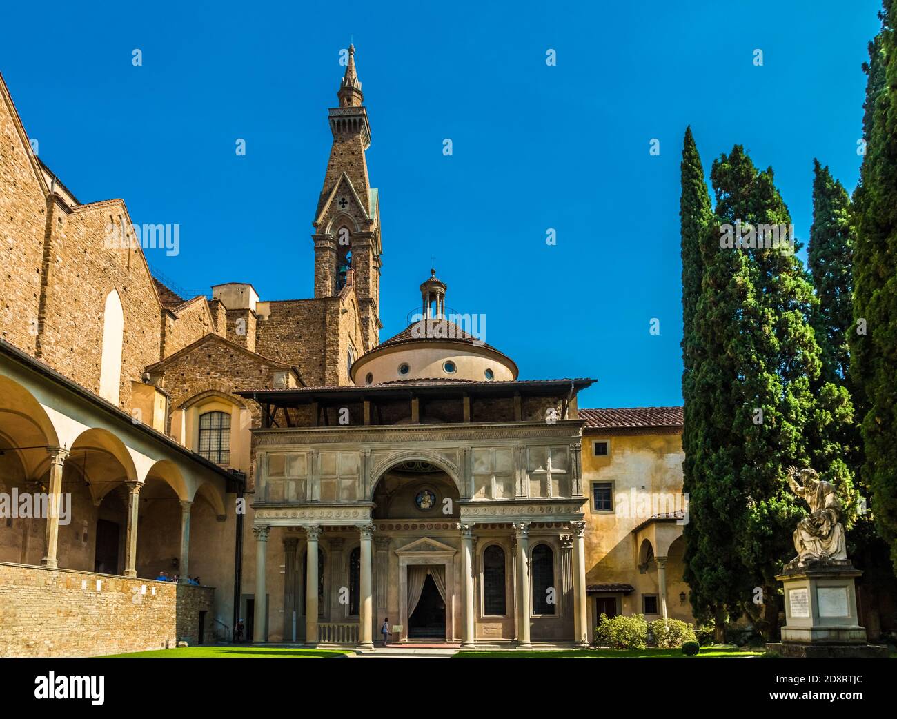 Gorgeous close-up view of the Pazzi Chapel in the cloister of the Basilica di Santa Croce in Florence, Italy. It has an arched portal topped by a... Stock Photo