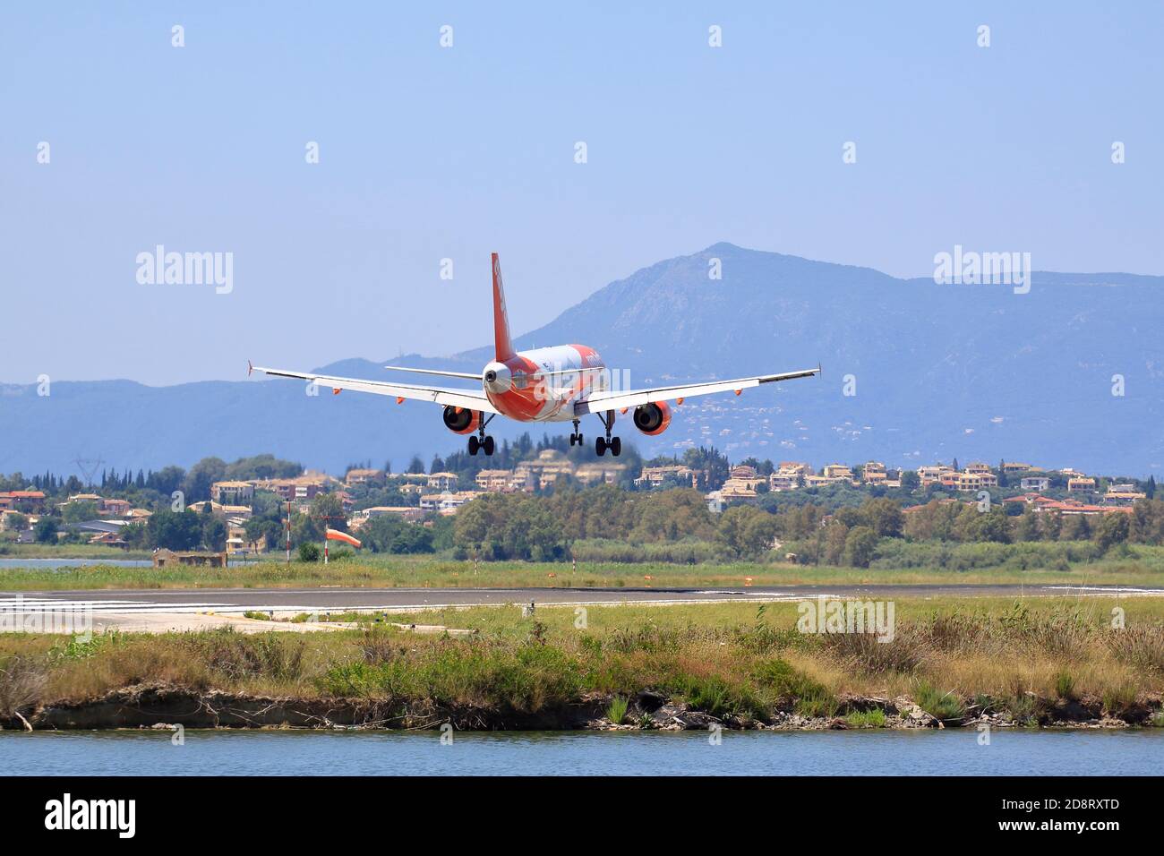 Airplane landing on Corfu and Paxis Stock Photo