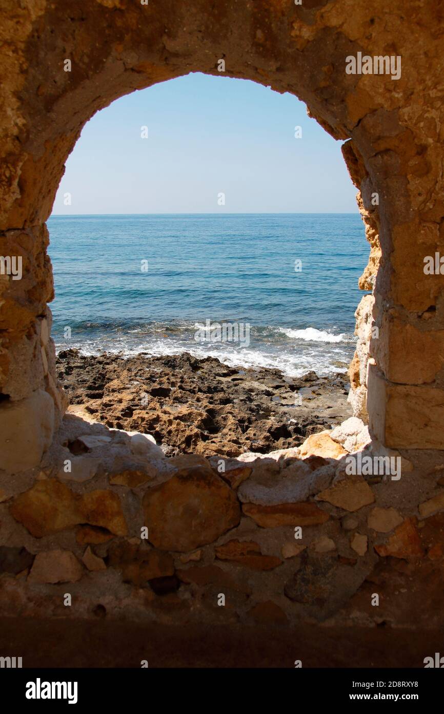 Stony window to the sea Stock Photo