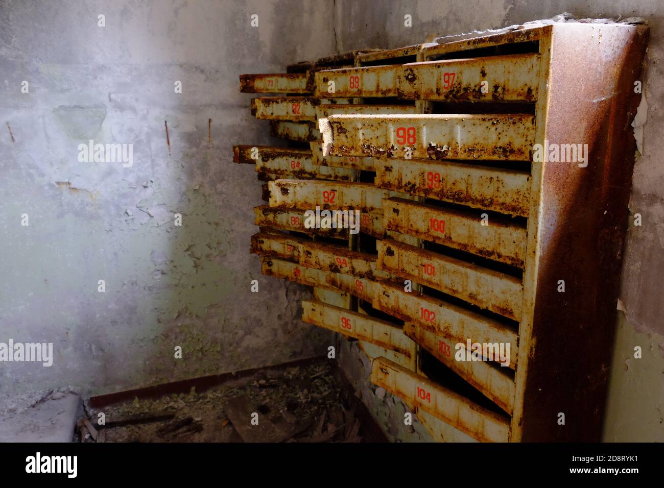 An old broken mailbox in an apartment building Stock Photo Alamy