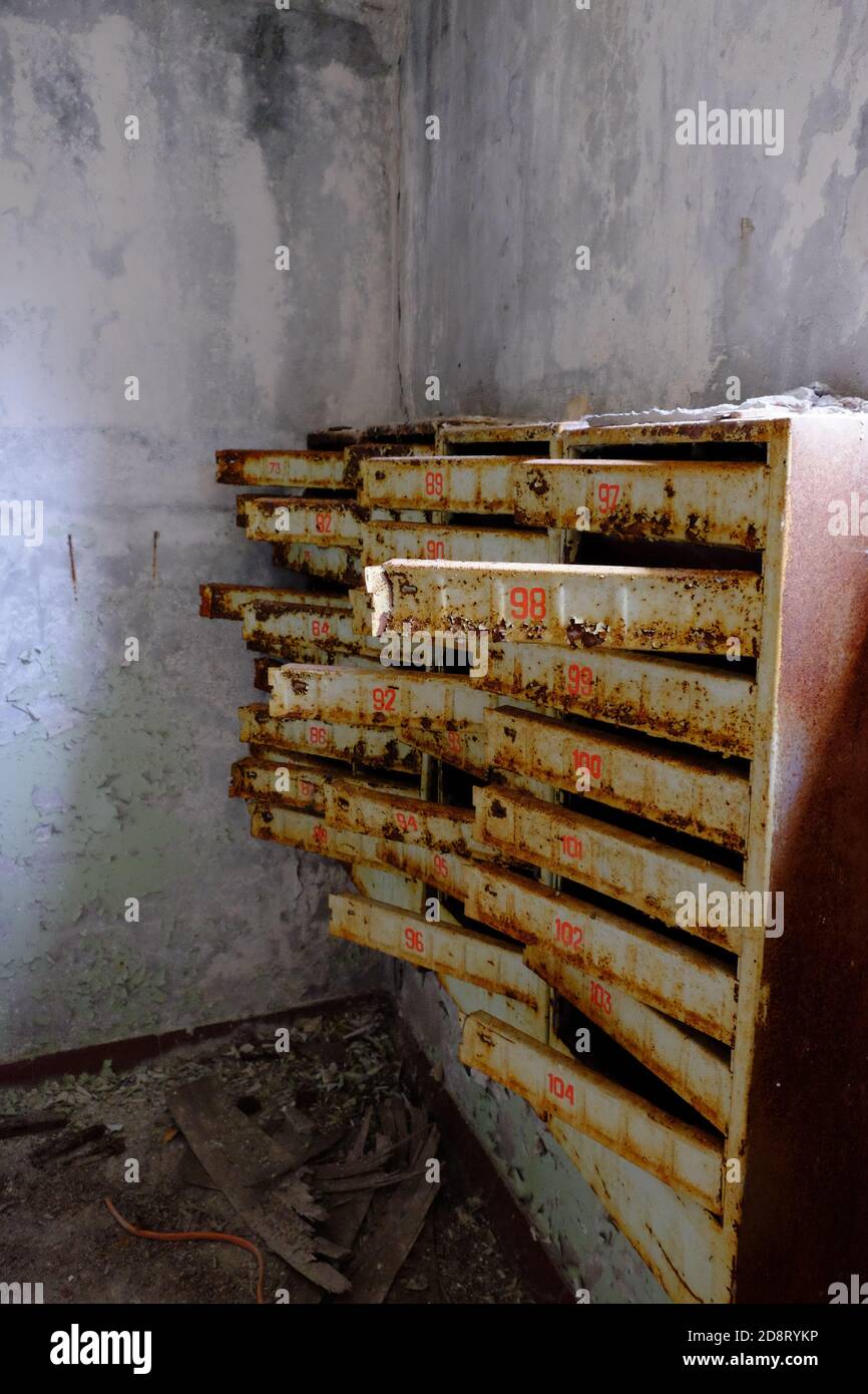 An old broken mailbox in an apartment building Stock Photo Alamy
